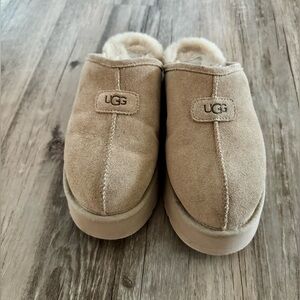 UGG Classic Beige Suede platform mules.